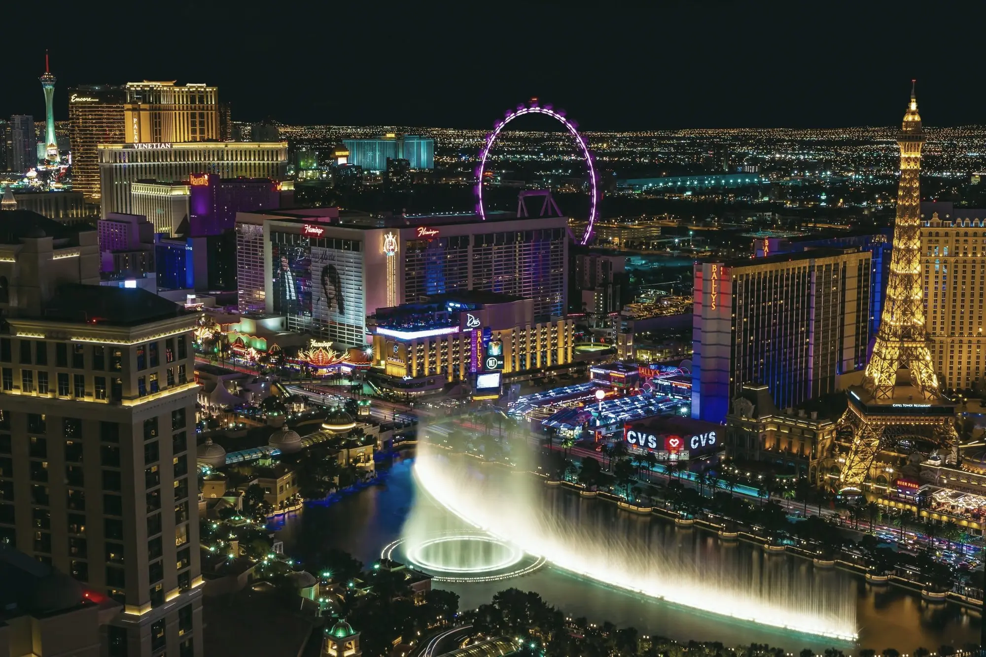 The Las Vegas skyline glowing with lights at night.
