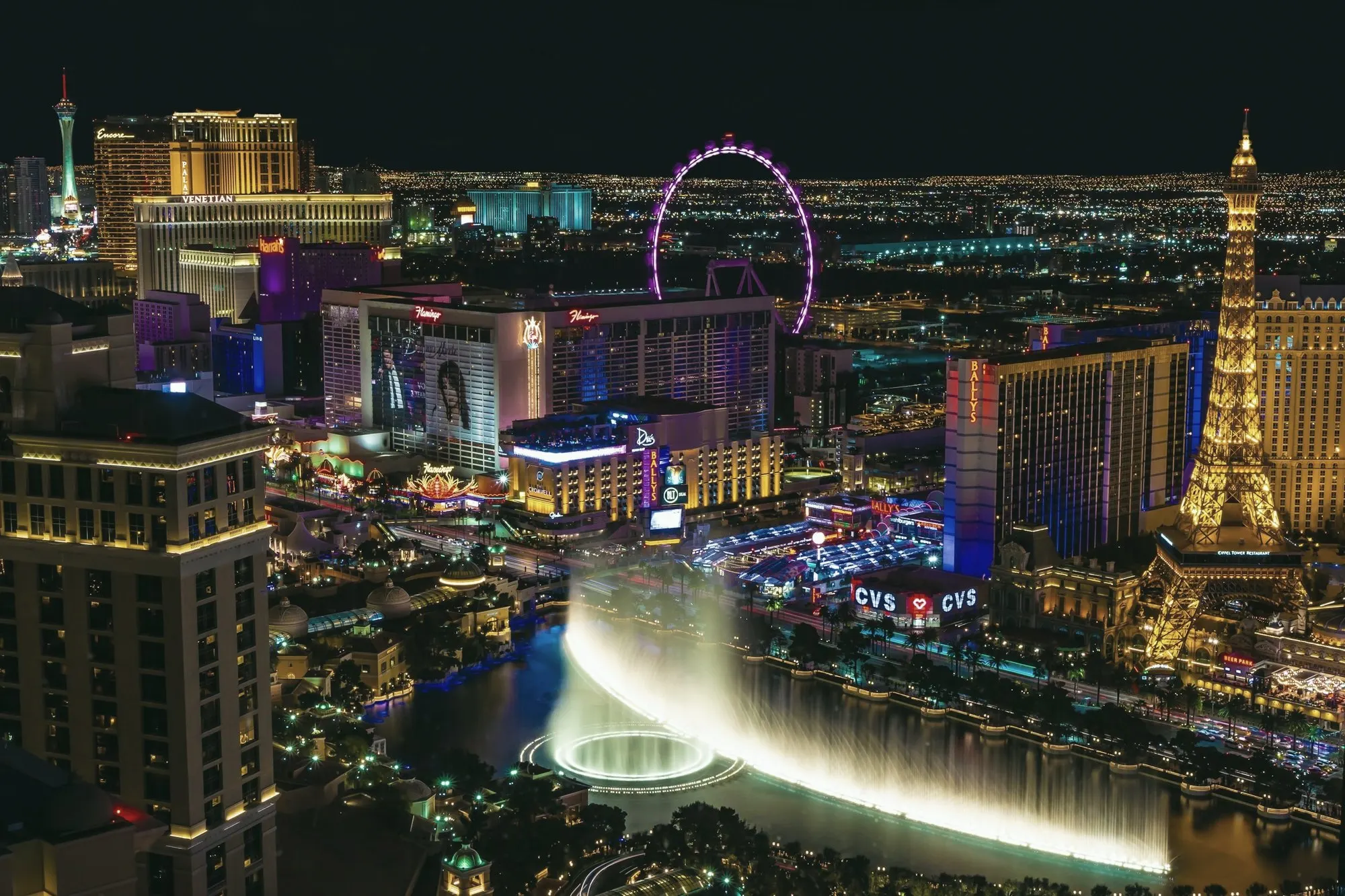 The Las Vegas skyline glowing with lights at night.