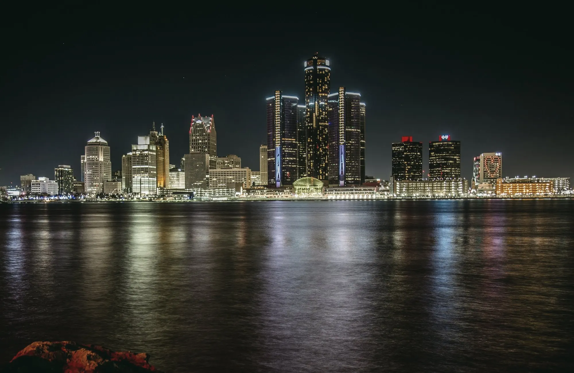 The Detroit skyline at night, seen across the Detroit River